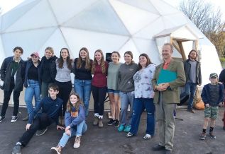 Al Macdonald and a group of students from the LPS class who originated and "sold" the idea of a greenhouse and a classroom/kitchen several years ago: most are now senior students at Sydenham High School.